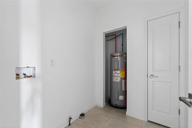 a view of an entryway with a hallway