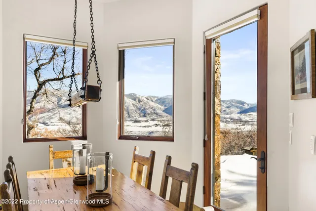 a dining room with window