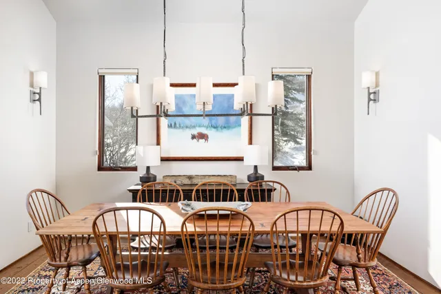 a view of a dining room with furniture