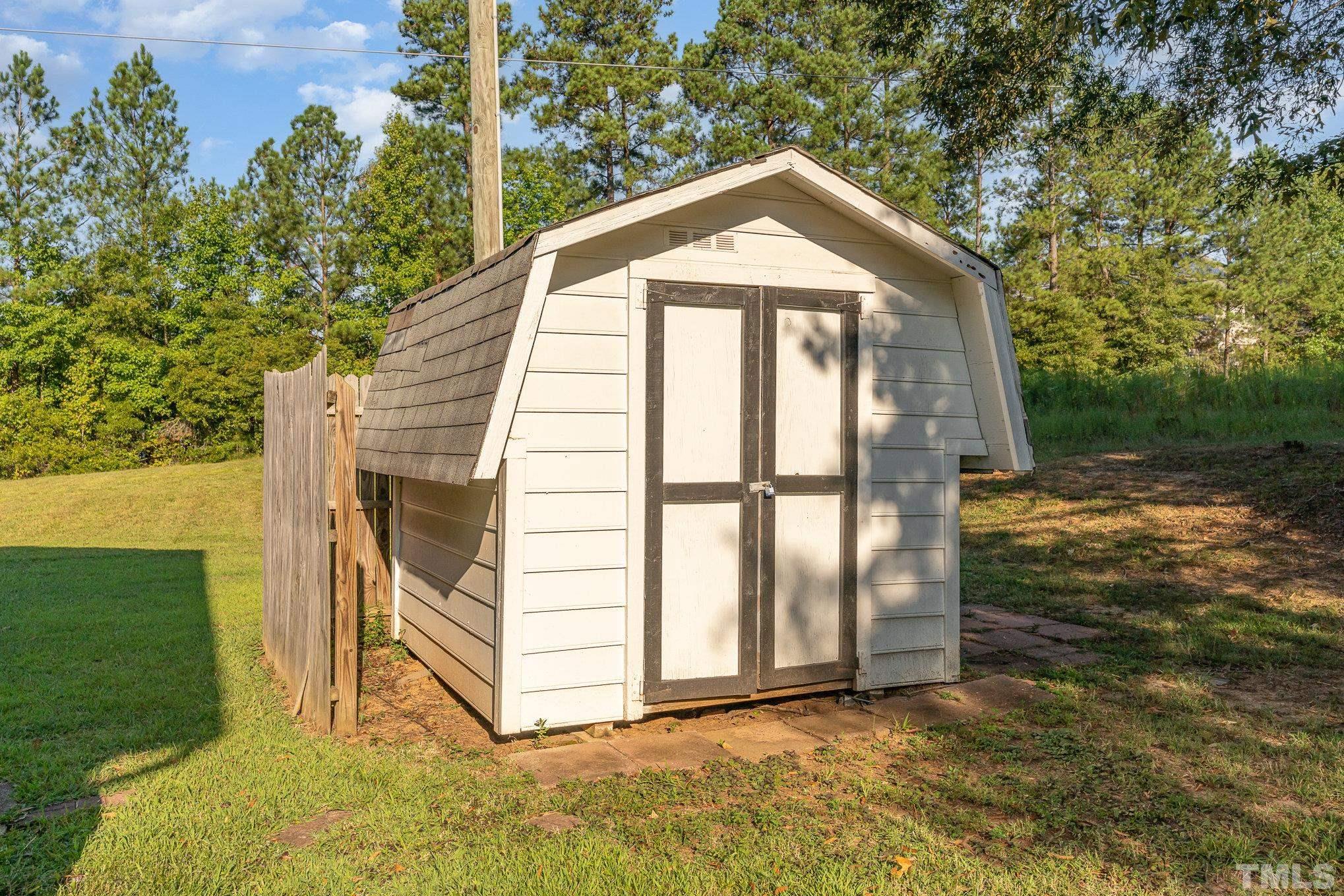 2014 Talloway Drive Cary, NC 27511 - Photo 12 of 18 a front view of a house with a yard