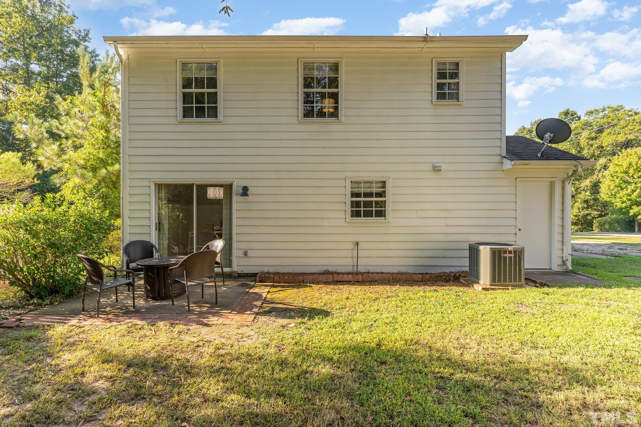 2014 Talloway Drive Cary, NC 27511 - Photo 14 of 18 a view of a house with a yard