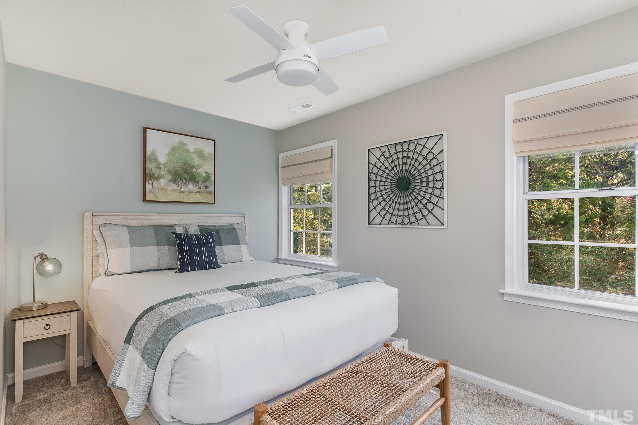 2014 Talloway Drive Cary, NC 27511 - Photo 8 of 18 a bedroom with a bed and a window