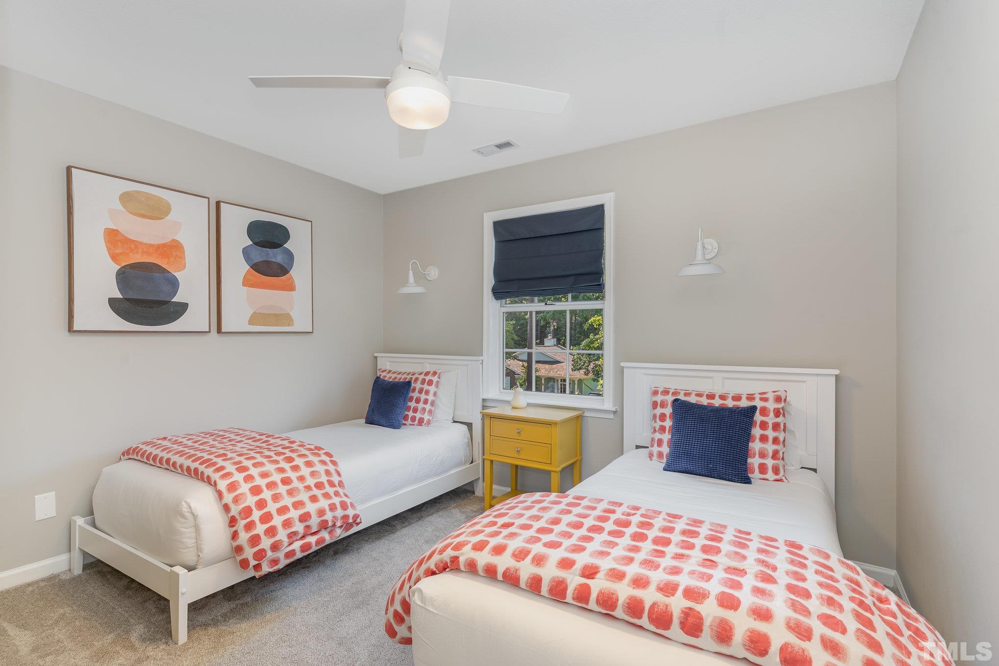 2014 Talloway Drive Cary, NC 27511 - Photo 9 of 18 a bedroom with a bed and a painting on the wall