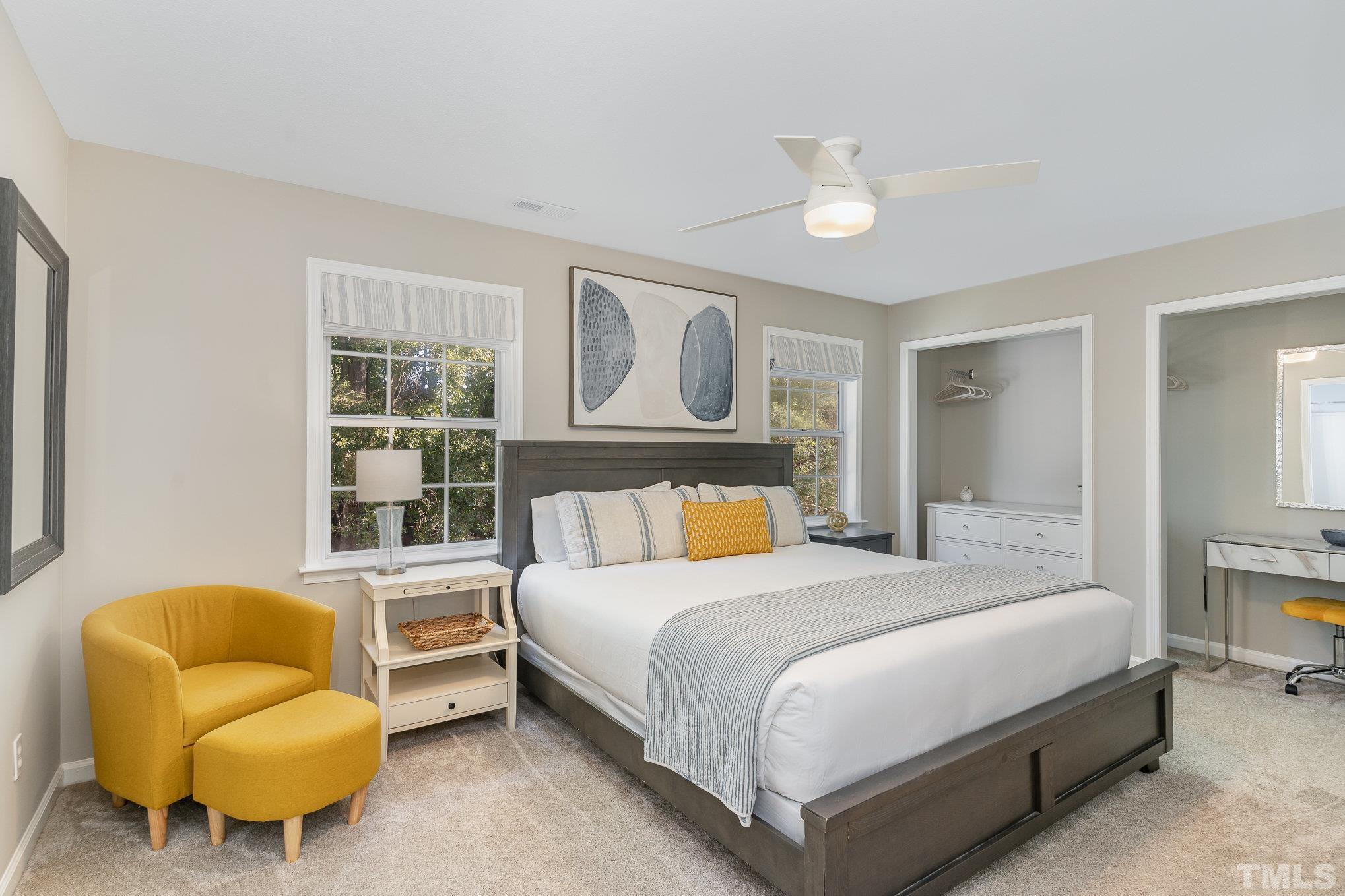 2014 Talloway Drive Cary, NC 27511 - Photo 10 of 18 a bedroom with a bed couch and window