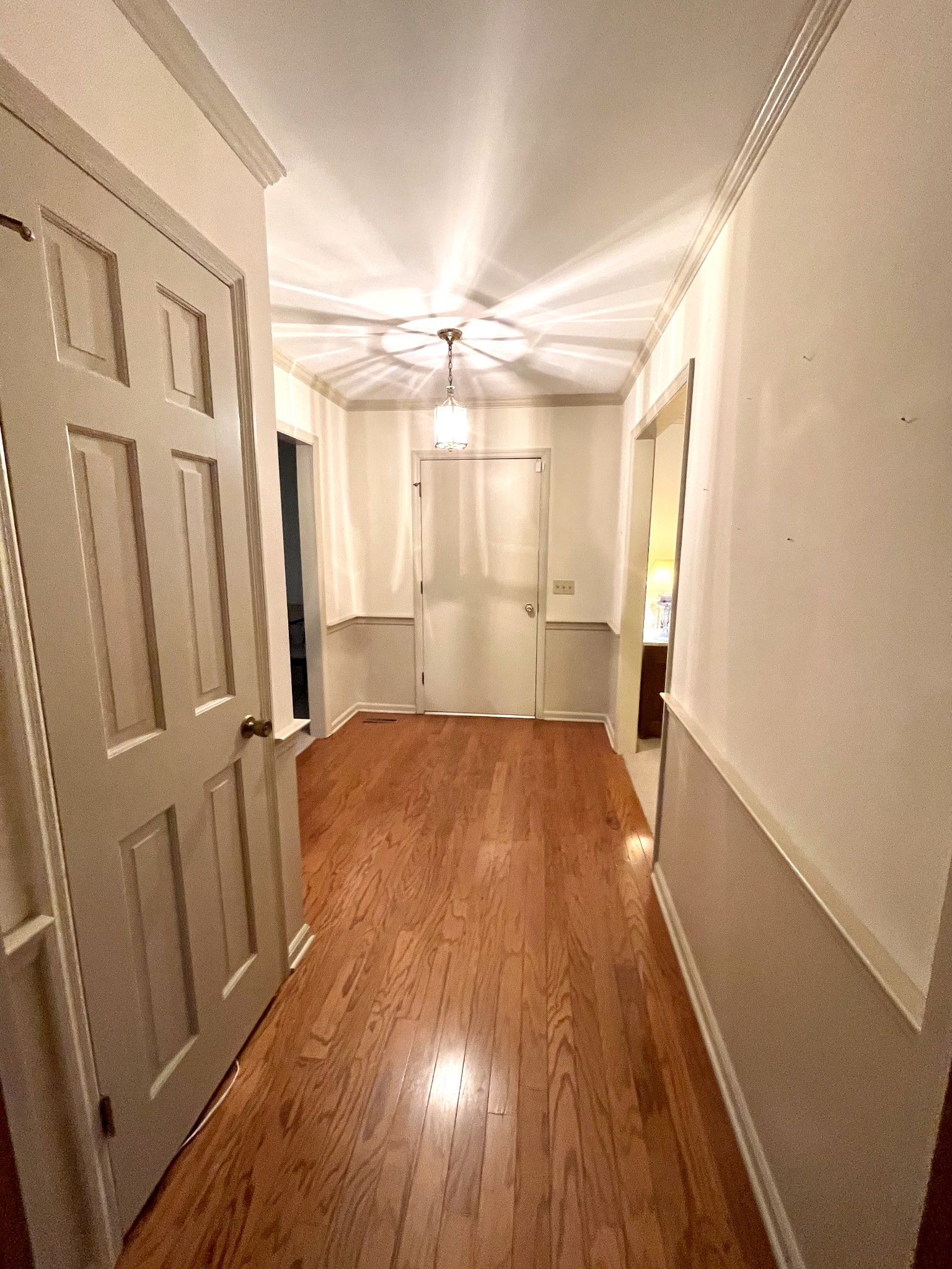 263 Lackey Lane Ripley, TN 38063 - Photo 3 of 12 wooden floor in an empty room with a window