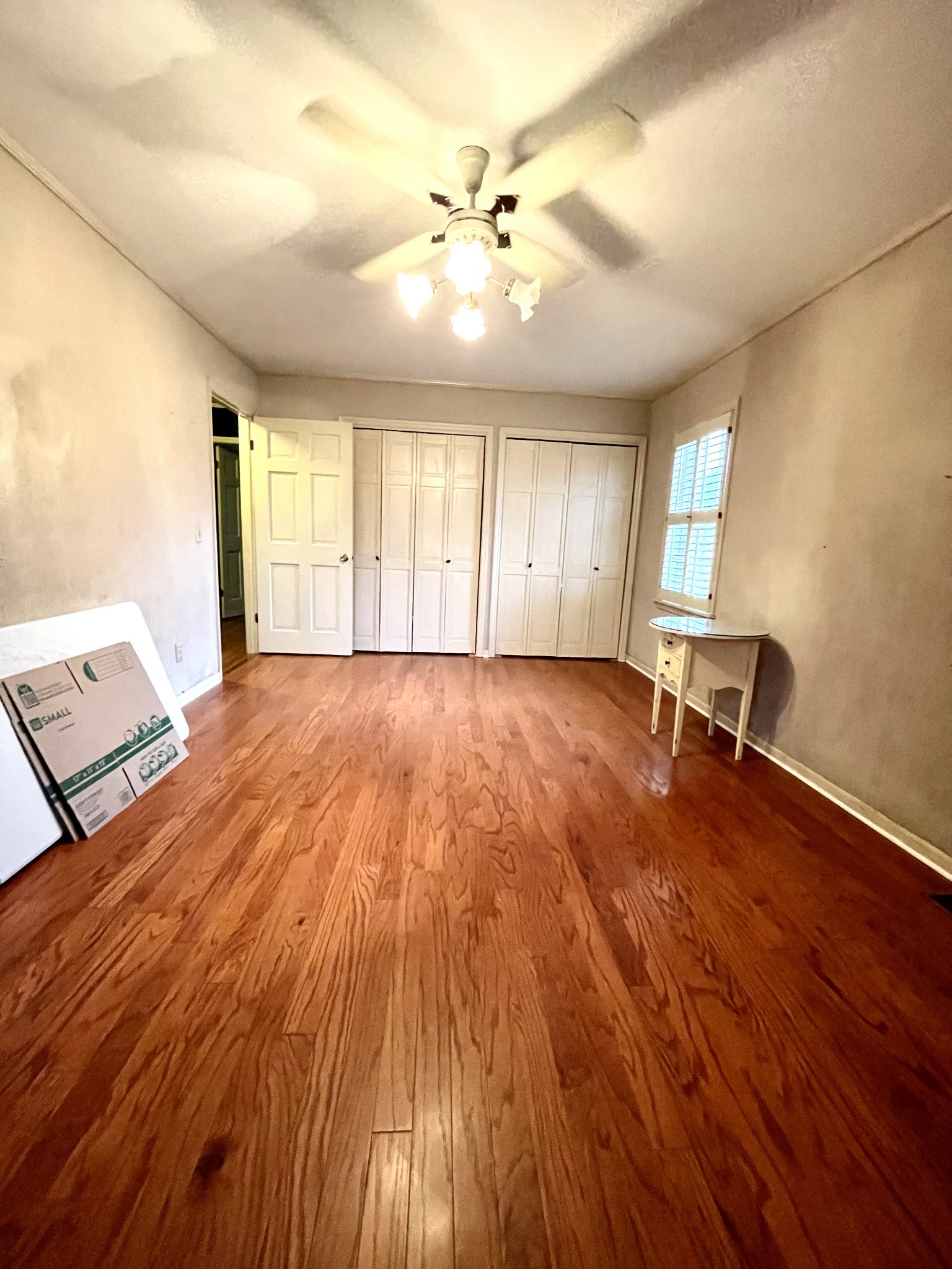 263 Lackey Lane Ripley, TN 38063 - Photo 10 of 12 wooden floor in an empty room with a window