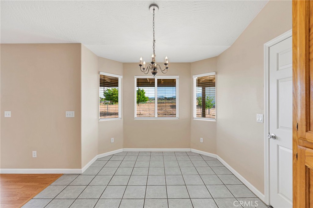 6271 Smoke Tree Road Phelan, CA 92371 - Photo 4 of 28 Off kitchen dining area