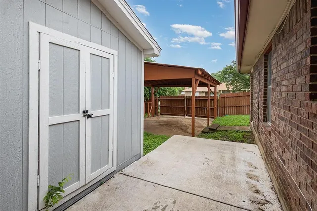 a view of a backyard with a garden