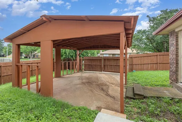 a view of a backyard with plants