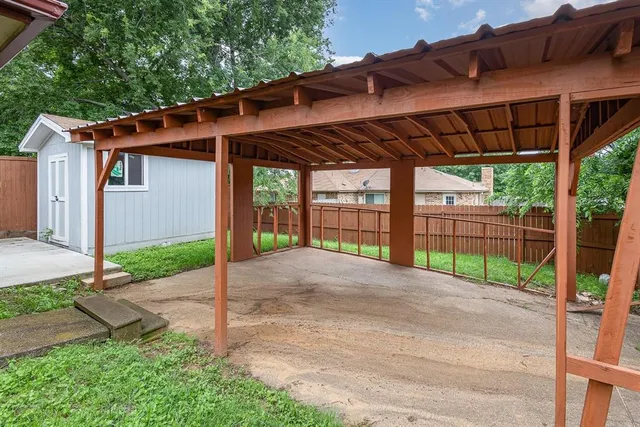 a view of backyard with green space