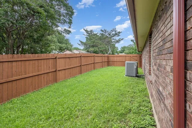a view of backyard with green space