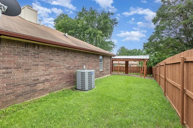 a backyard of a house with lots of green space