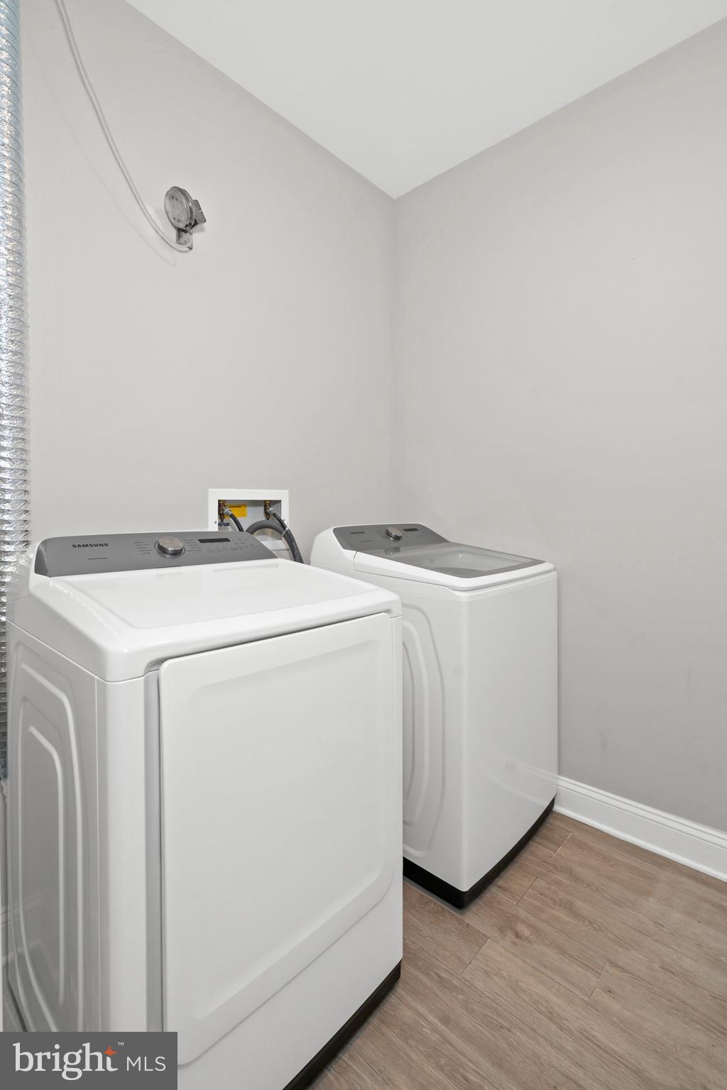 3000 Fountainview Circle, Unit 301 Newark, DE 19713 - Photo 17 of 17 a utility room with dryer and washer