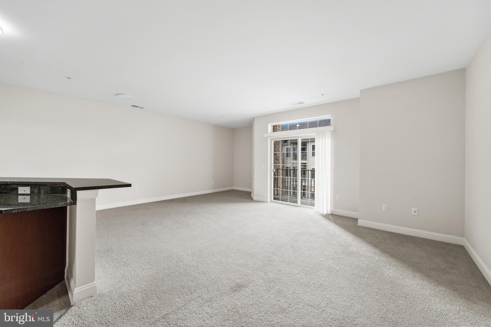 3000 Fountainview Circle, Unit 301 Newark, DE 19713 - Photo 3 of 17 a view of an empty room with a window