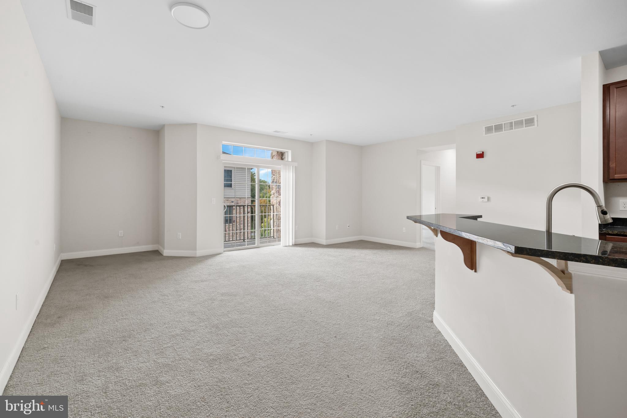 3000 Fountainview Circle, Unit 301 Newark, DE 19713 - Photo 5 of 17 a kitchen with sink and window