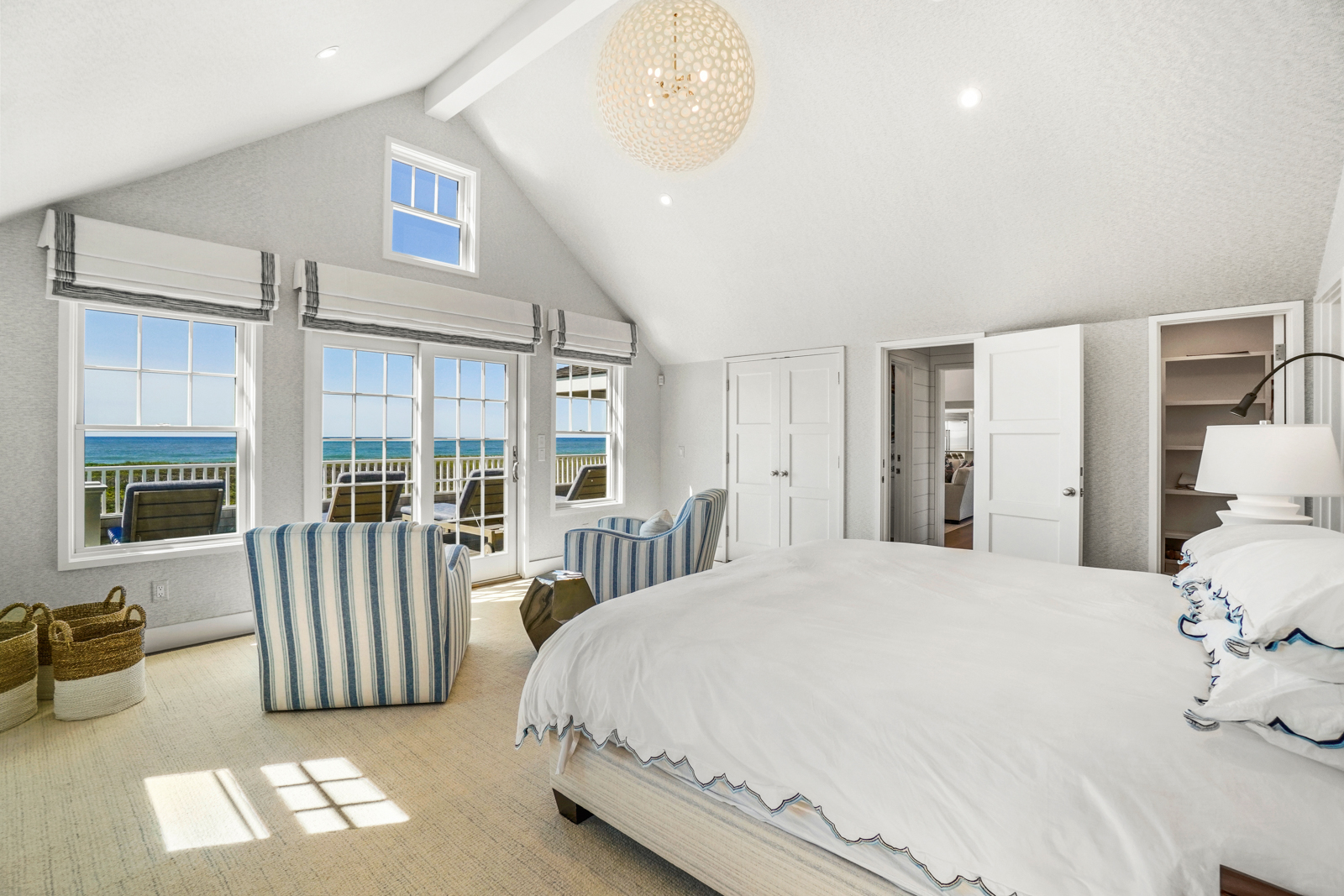 2 Marion Avenue Nantucket, MA 02554 - Photo 28 of 43 a spacious bedroom with a bed and a large window