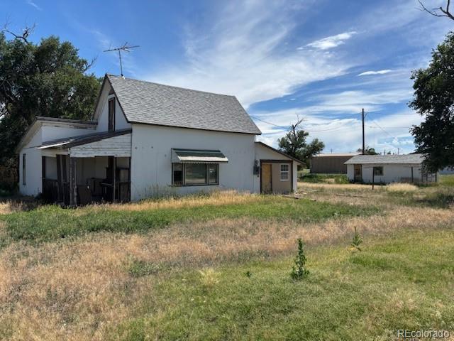 214 Short Ordway, CO 81063 - Photo 1 of 10 a front view of a house with garden