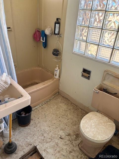 214 Short Ordway, CO 81063 - Photo 6 of 10 a bathroom with a toilet and a bathtub