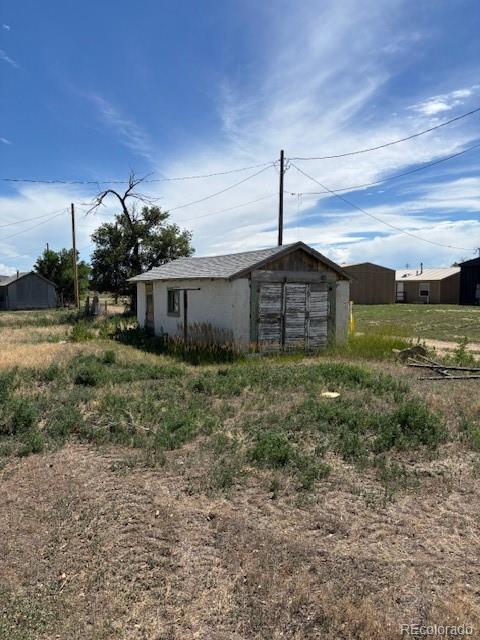 214 Short Ordway, CO 81063 - Photo 7 of 10 a front view of a house with garden