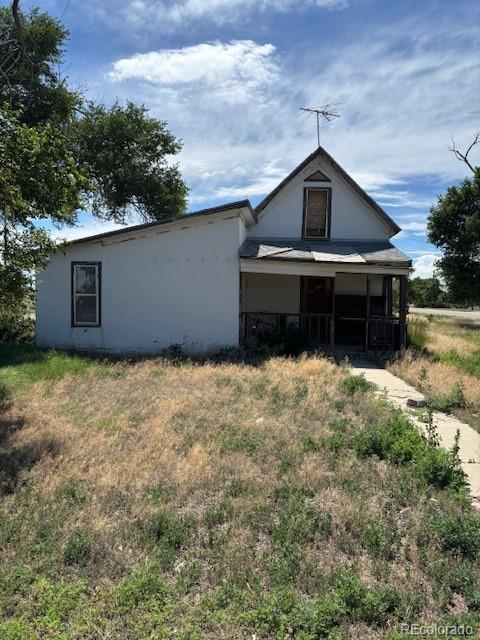 214 Short Ordway, CO 81063 - Photo 9 of 10 a front view of a house with a yard