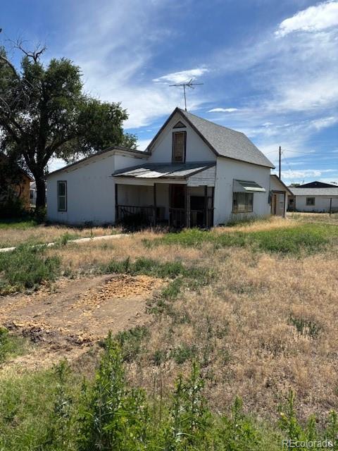 214 Short Ordway, CO 81063 - Photo 10 of 10 a front view of a house with a yard
