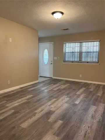 an empty room with windows