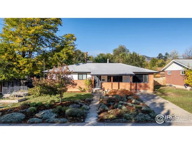 a black and white photo of a house