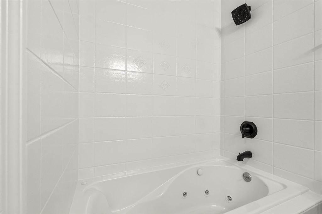 5 Main Street, Unit 5 Boston, MA 02129 - Photo 12 of 19 a bathroom with a tub