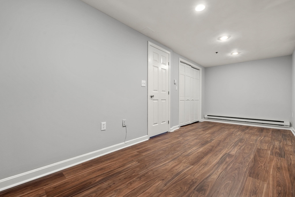 5 Main Street, Unit 5 Boston, MA 02129 - Photo 16 of 19 a view of room with wooden floor