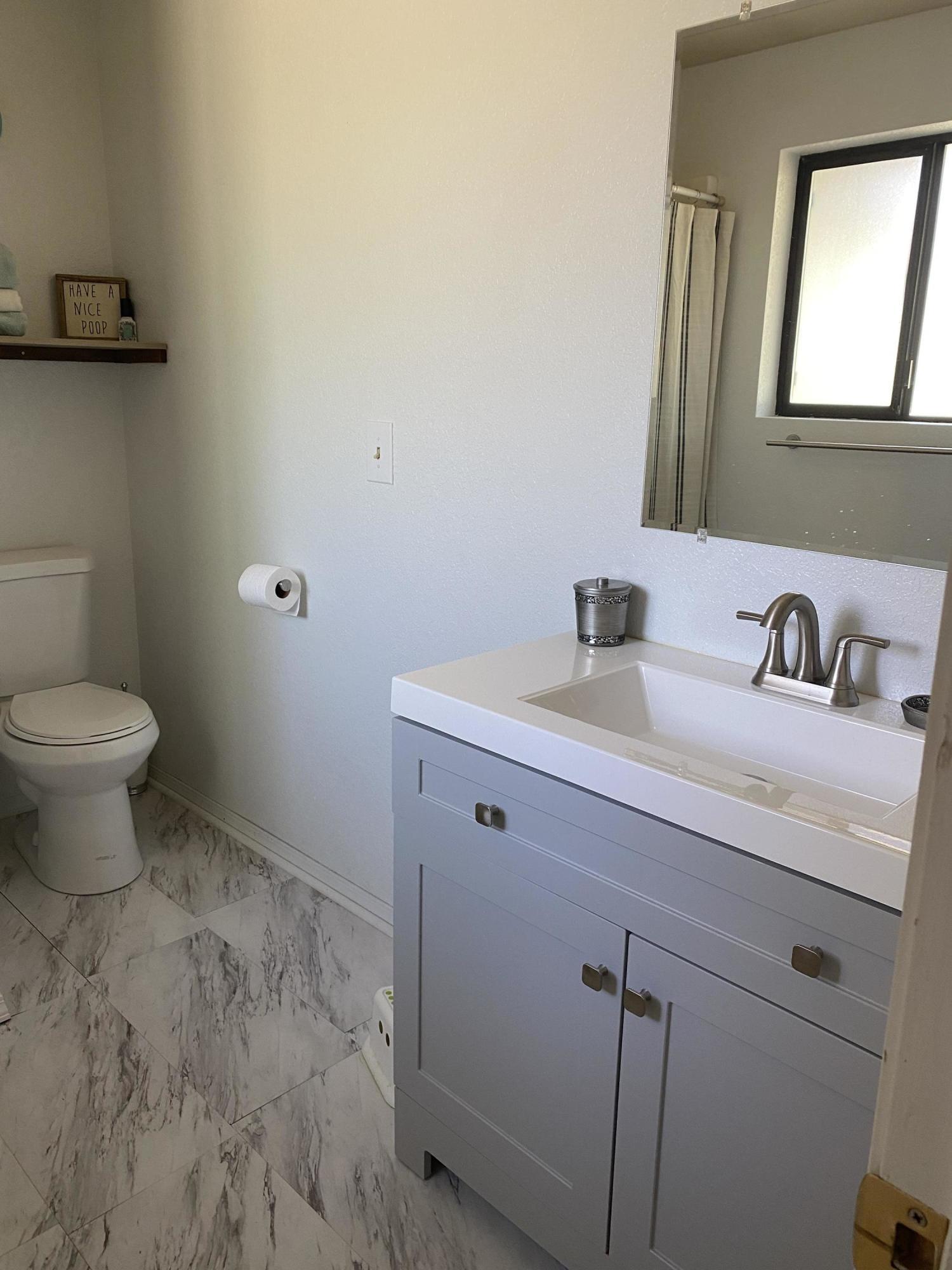 1260 Beffa Road Tieton, WA 98947 - Photo 19 of 38 a bathroom with a sink and a toilet