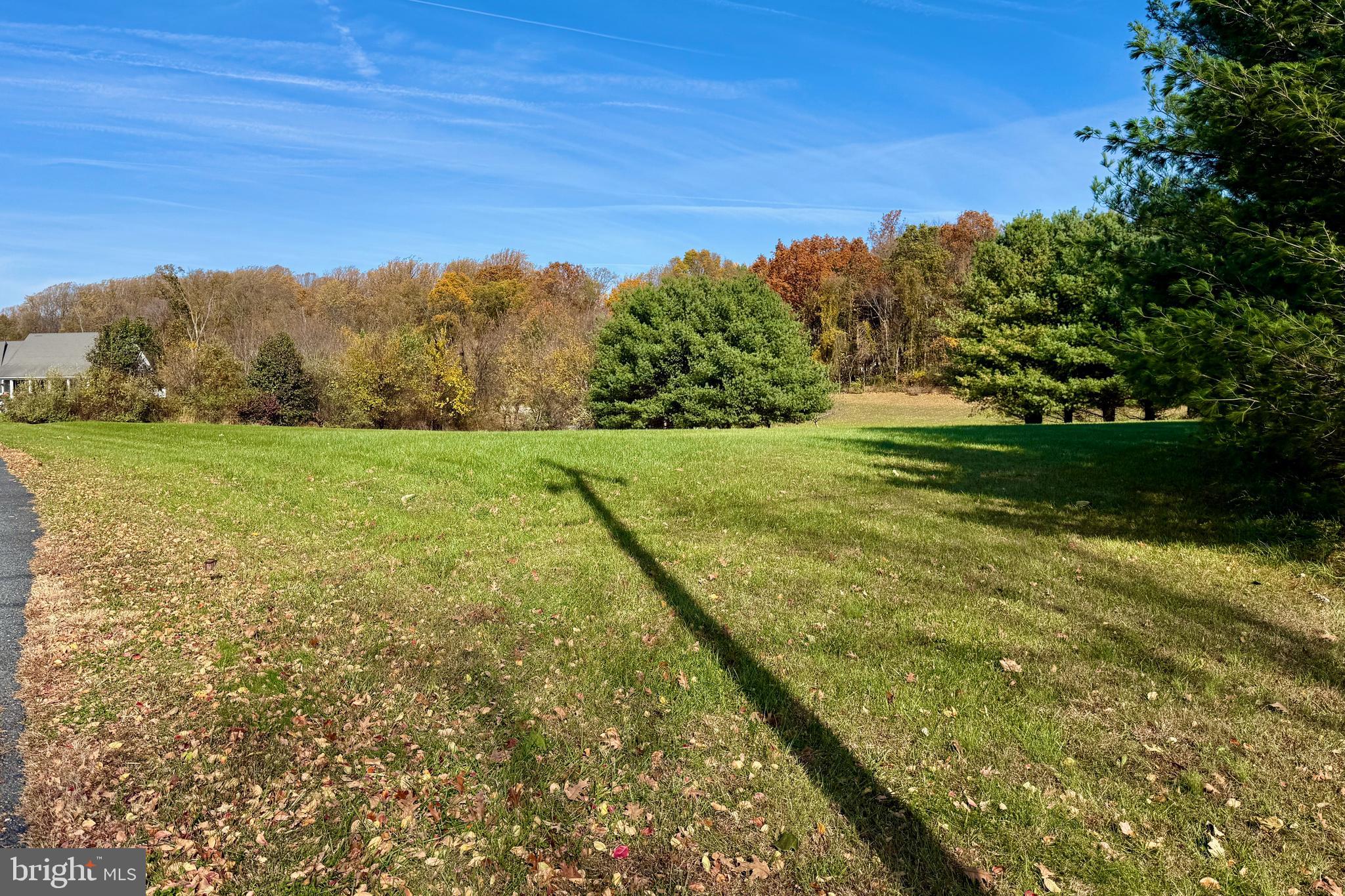 Still Pond Creek Road Worton, MD 21678 - Photo 3 of 9 a view of a field with an ocean