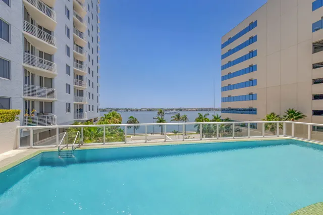 a view of swimming pool with outdoor seating