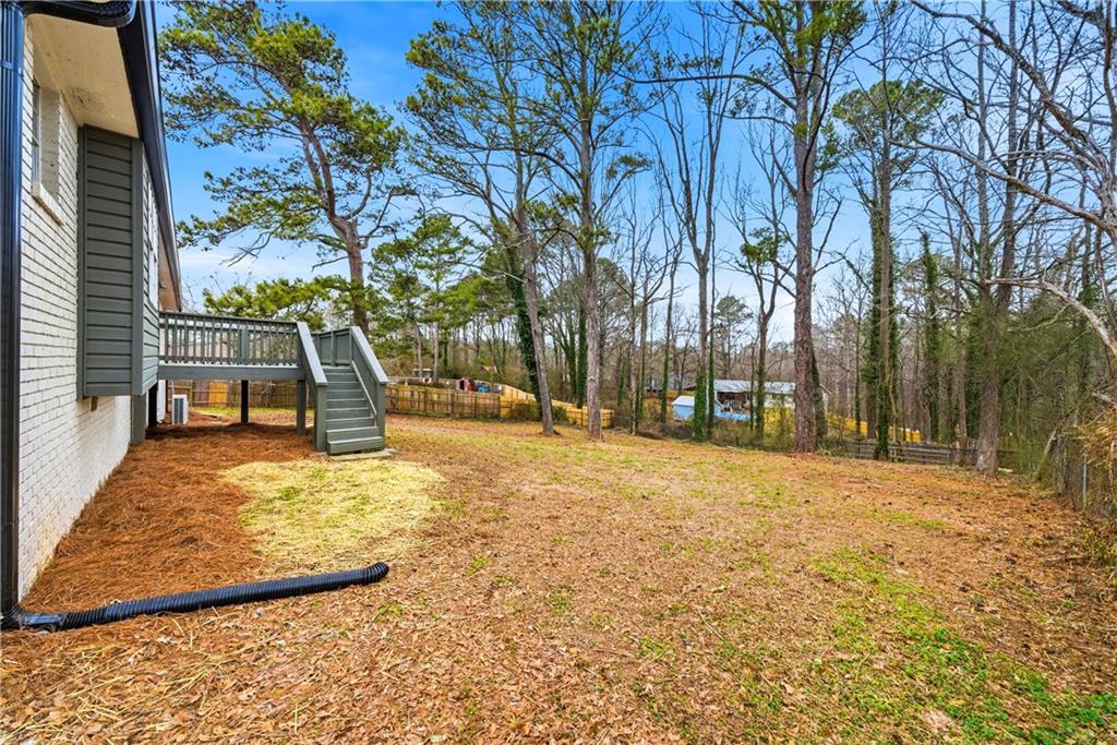 7258 Banks Mill Road Douglasville, GA 30135 - Photo 21 of 23 a view of yard with tree