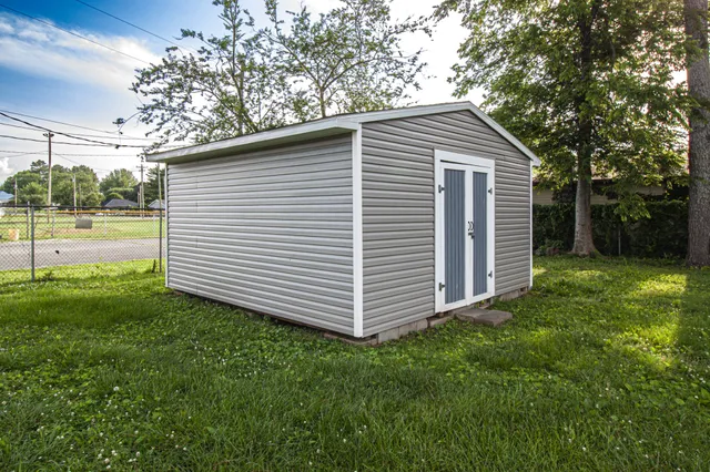 a front view of a house with garage