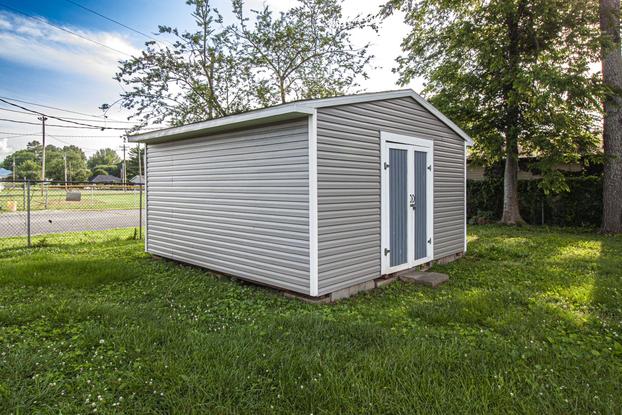 121 Popular Street North Cowan, TN 37318 - Photo 42 of 46 a view of a backyard with plants and large tree