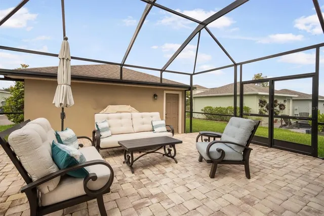 a front view of a house with a yard and porch