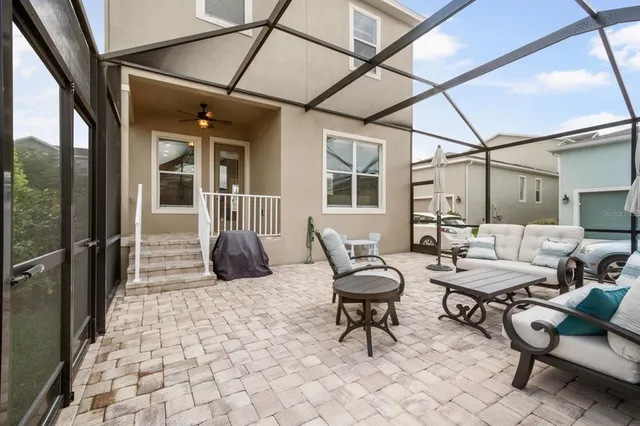a front view of a house with a garden and plants