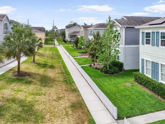 front view of a house with a garden