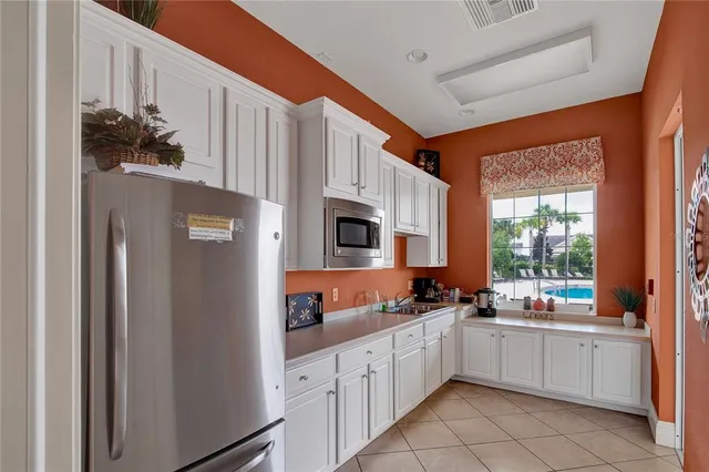 a view of a park with large trees