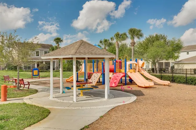 a view of a building with sitting area