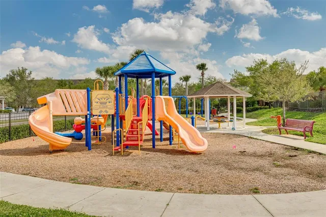 a view of a dinning table and chairs in the patio