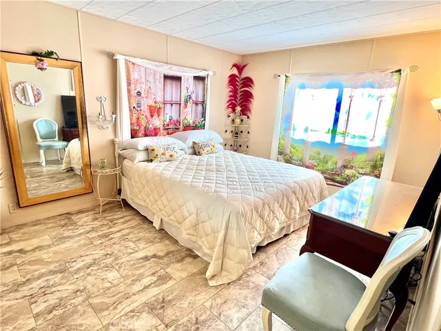 a bed room with a bed and a couch