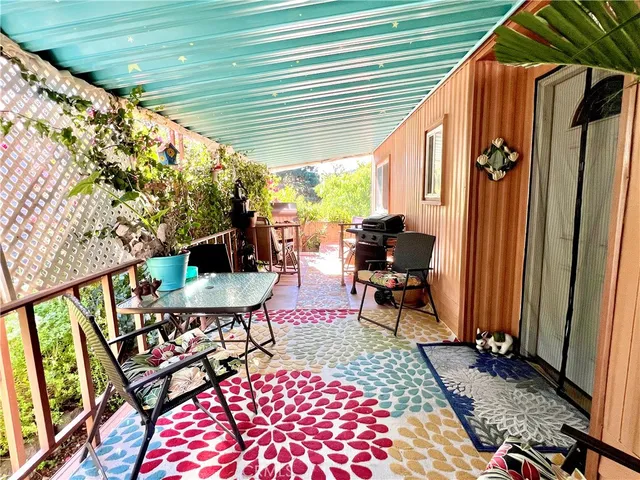 a backyard of a house with seating space