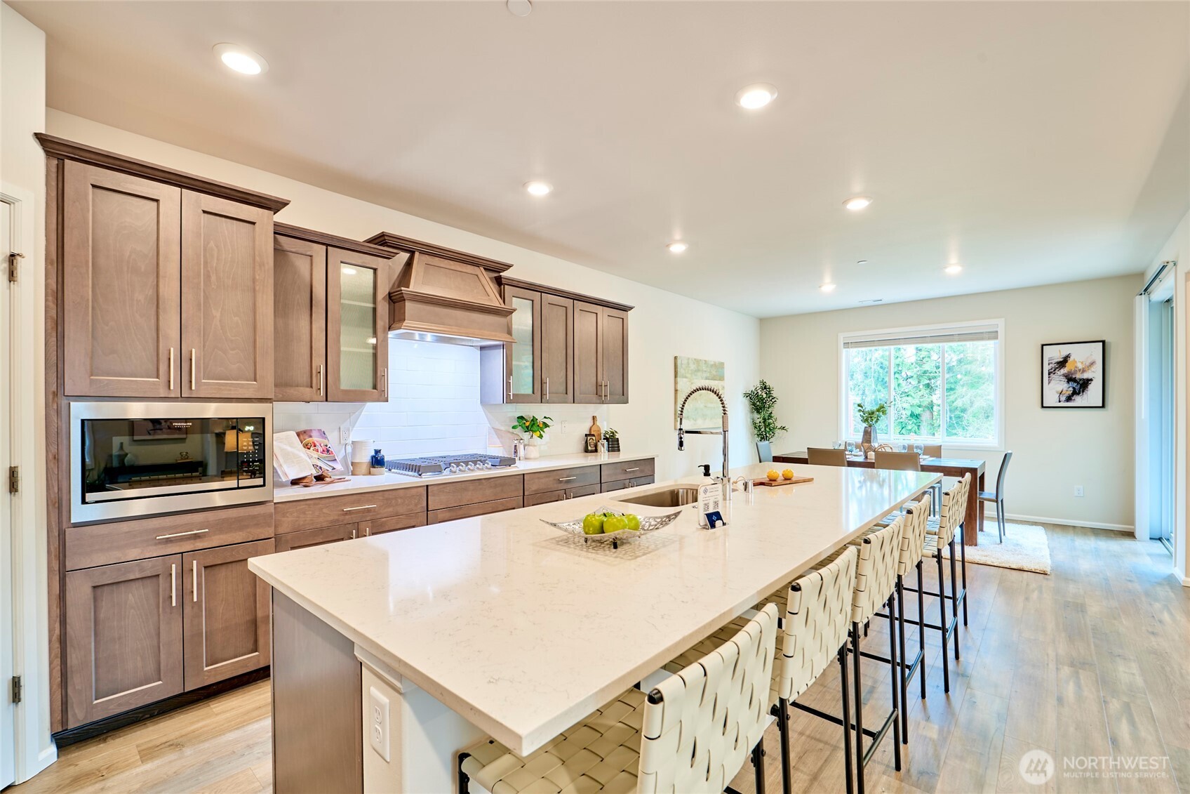 4022 233rd Street Southeast Bothell, WA 98021 - Photo 13 of 40 a kitchen with a stove a sink and a refrigerator