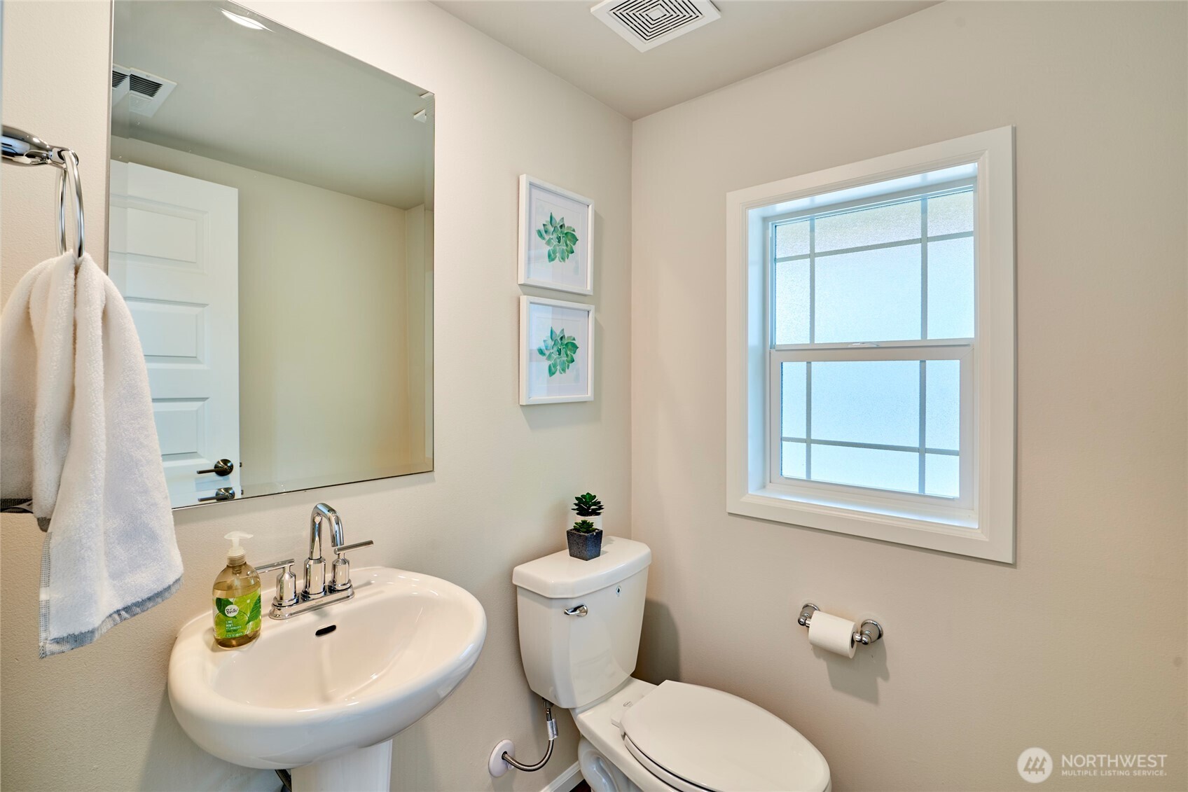 4022 233rd Street Southeast Bothell, WA 98021 - Photo 14 of 40 a bathroom with a sink a toilet and a mirror