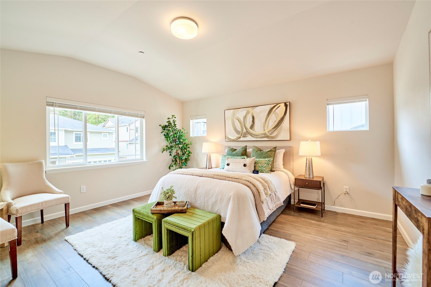 4022 233rd Street Southeast Bothell, WA 98021 - Photo 16 of 40 a bedroom with a bed chair and window