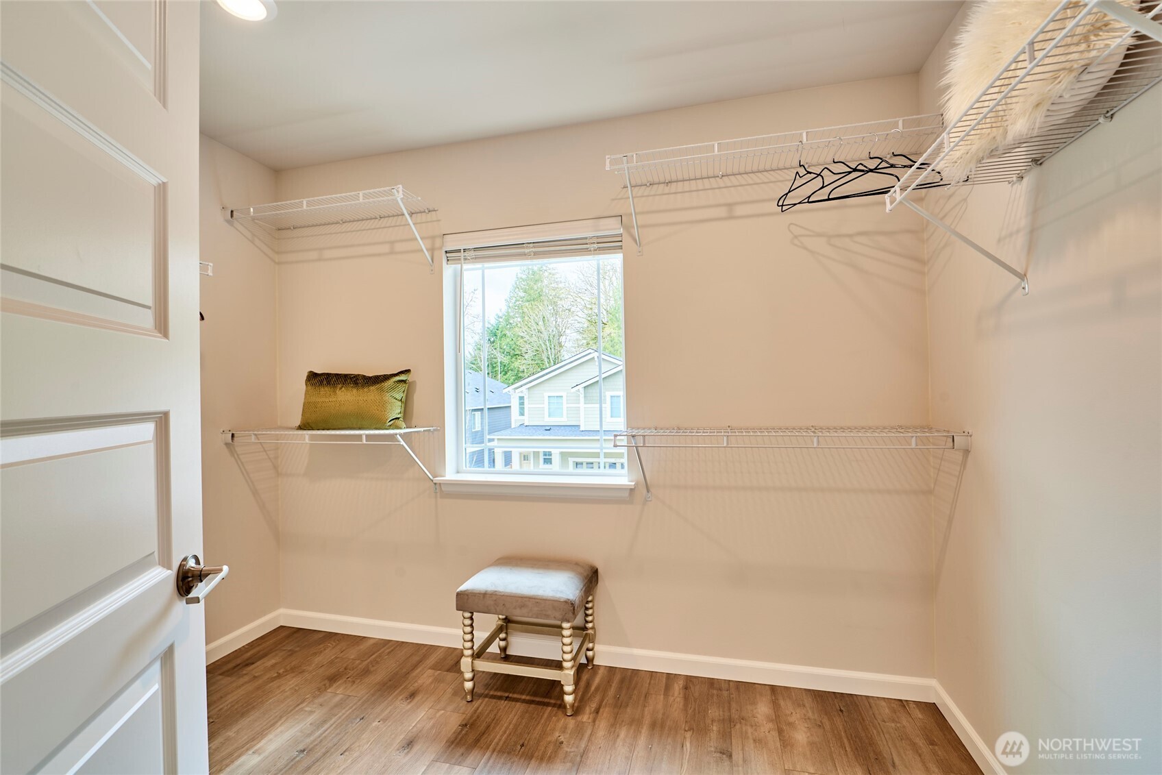 4022 233rd Street Southeast Bothell, WA 98021 - Photo 18 of 40 a view of a room with wooden floor and a window