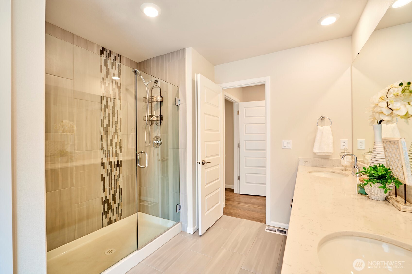 4022 233rd Street Southeast Bothell, WA 98021 - Photo 21 of 40 a bathroom with a tub shower and sink