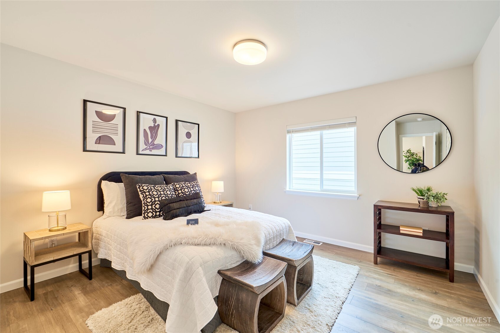 4022 233rd Street Southeast Bothell, WA 98021 - Photo 22 of 40 a bedroom with a bed and a dresser