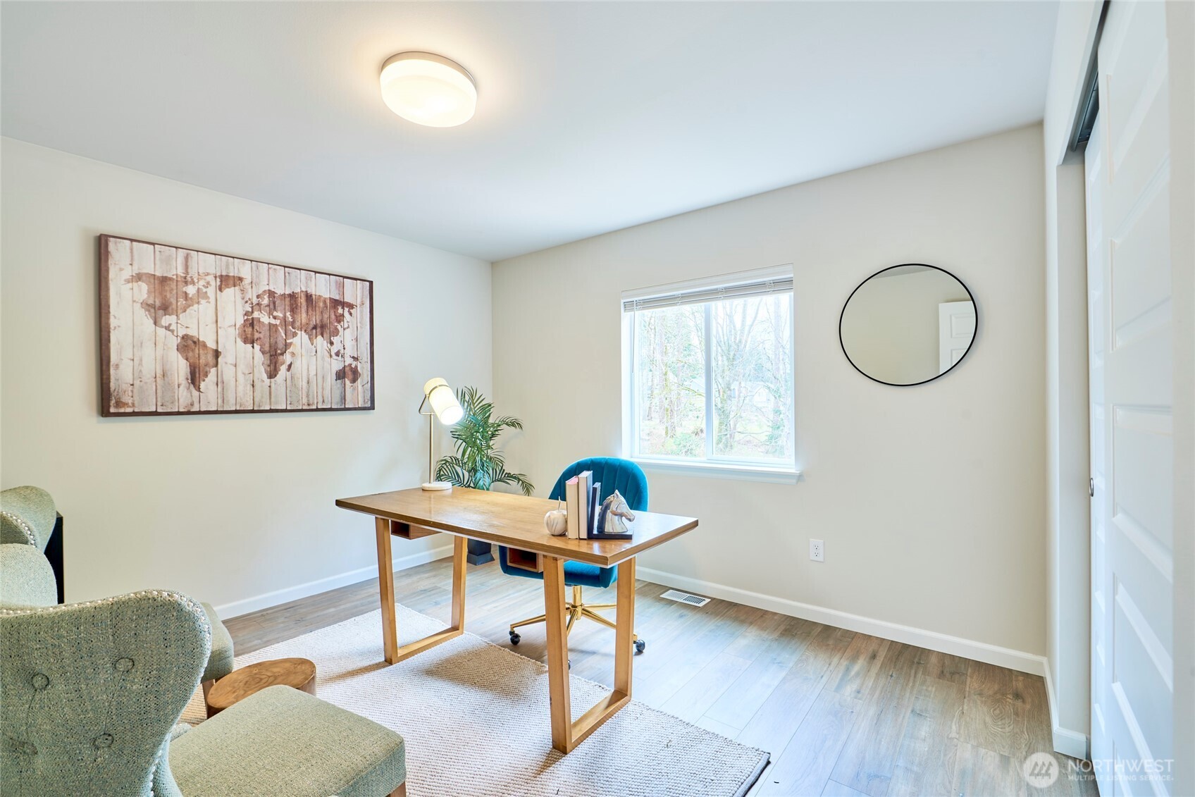 4022 233rd Street Southeast Bothell, WA 98021 - Photo 27 of 40 a workspace with furniture and window
